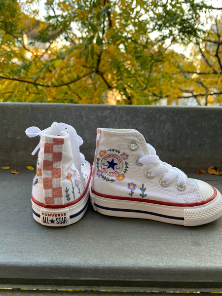 Checkered floral high top converse
