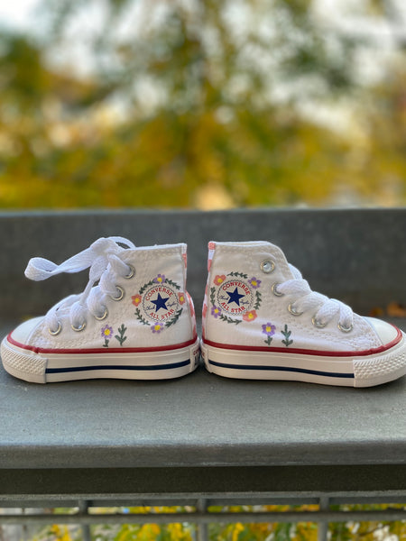 Checkered floral high top converse