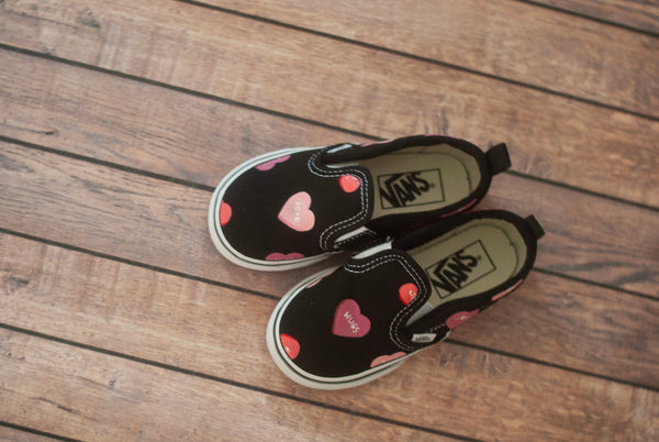 handpainted convo hearts on black slip on vans 