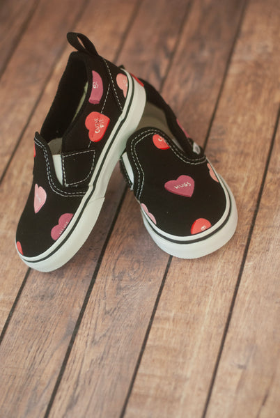 handpainted convo hearts on black slip on vans 